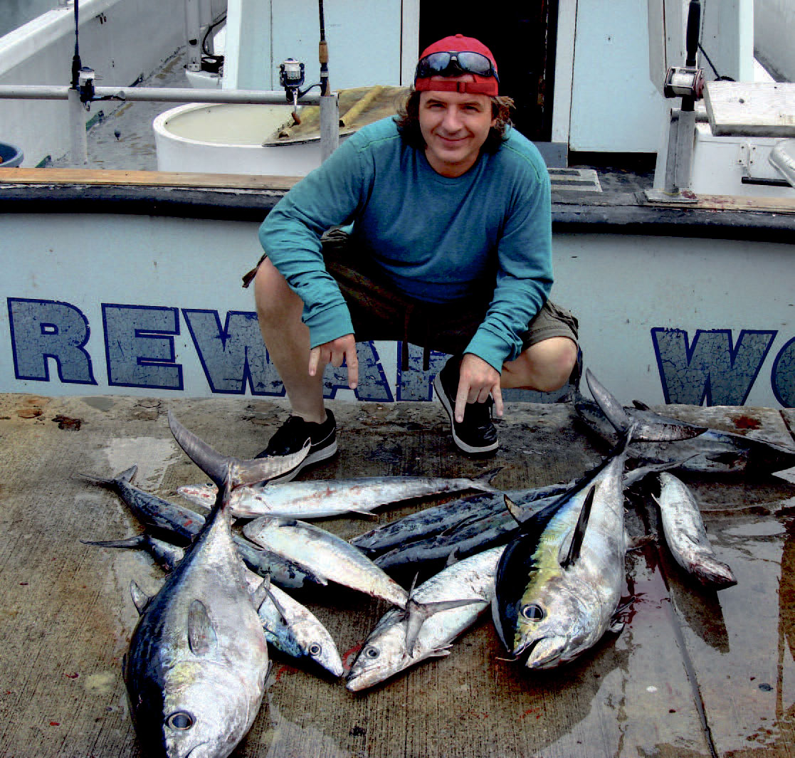 Henning med en blandettrollingsfangst af småtun, spanish mackerel og kingfish, taget under en af hans mange tattoveringsture til USA.