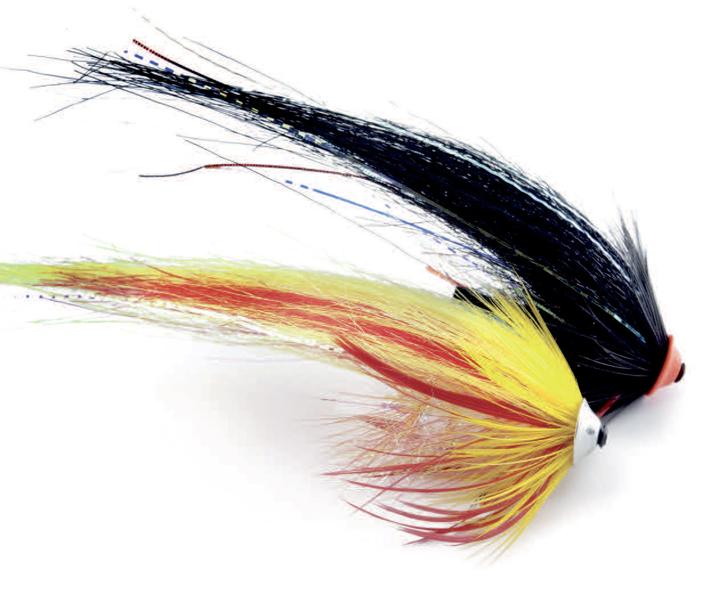 Klassiske fluemønstre i nyeudgaver, som virker i Varde Å. Øverst Black & Silver og nederst Mickey Finn.