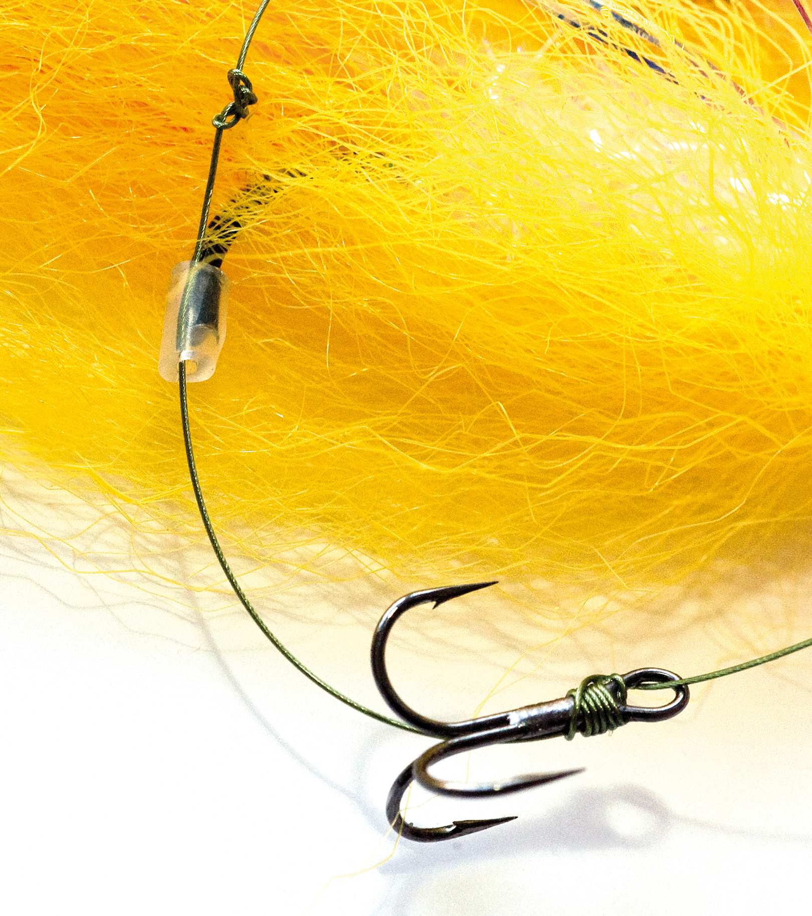 5) Kør et 4-5 mm silicone tube (y)på tampen bag krogen – og bind en stor kællingeknude (z) bagerst, så tuben ikke glider af.